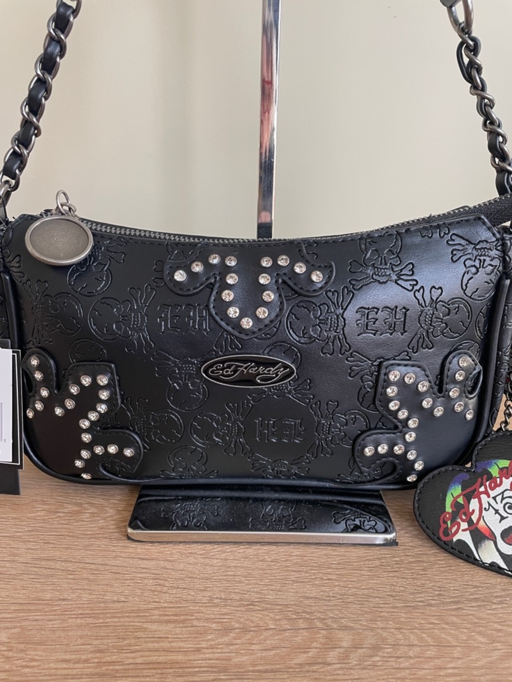 ED HARDY BLACK EMBOSSED SKULL BAGUETTE BAG with Rhinestone Studs and Bag Charm - Picture 3 of 13